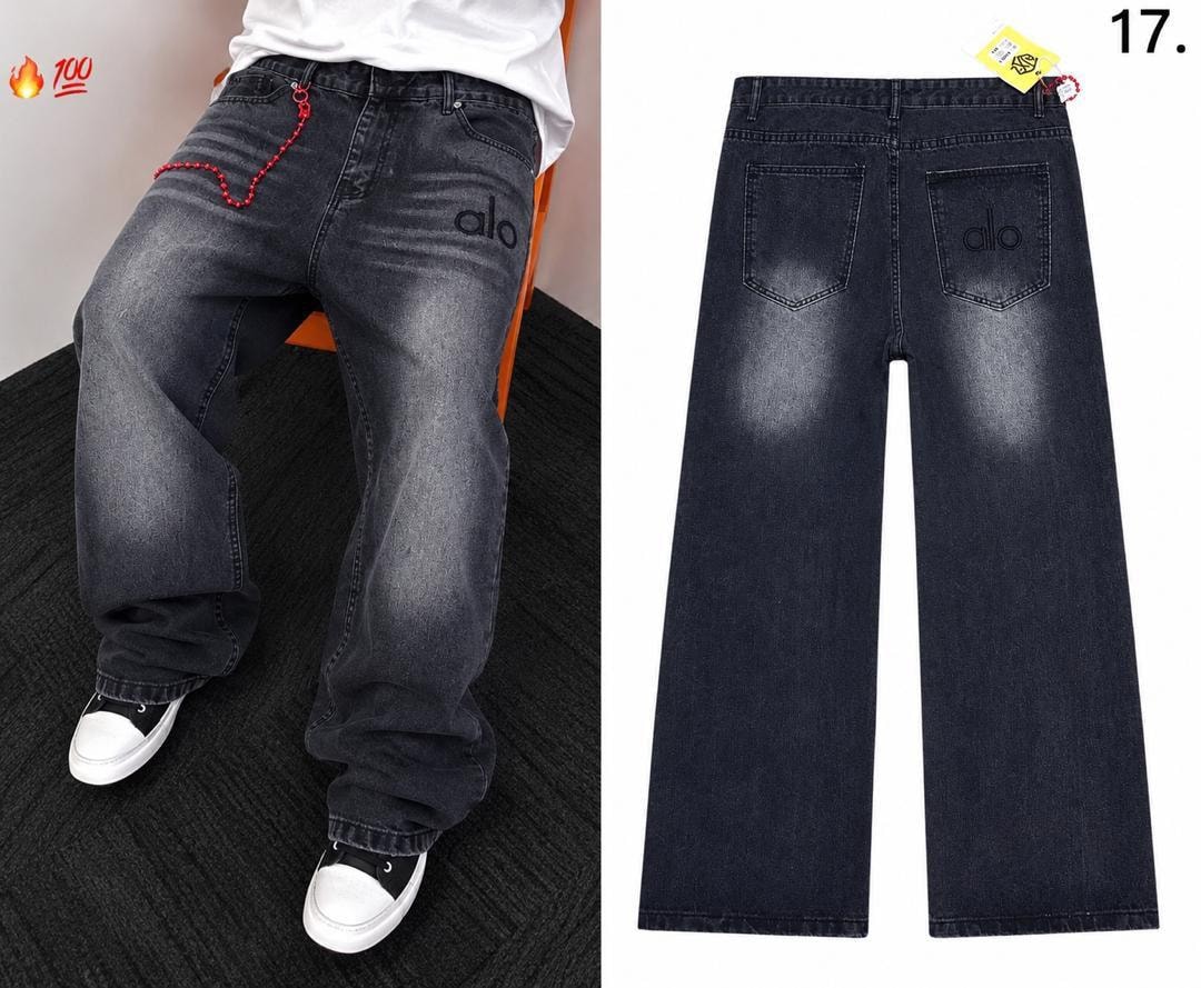 Person wearing black alo logo baggy jeans with red chain and back flat view.