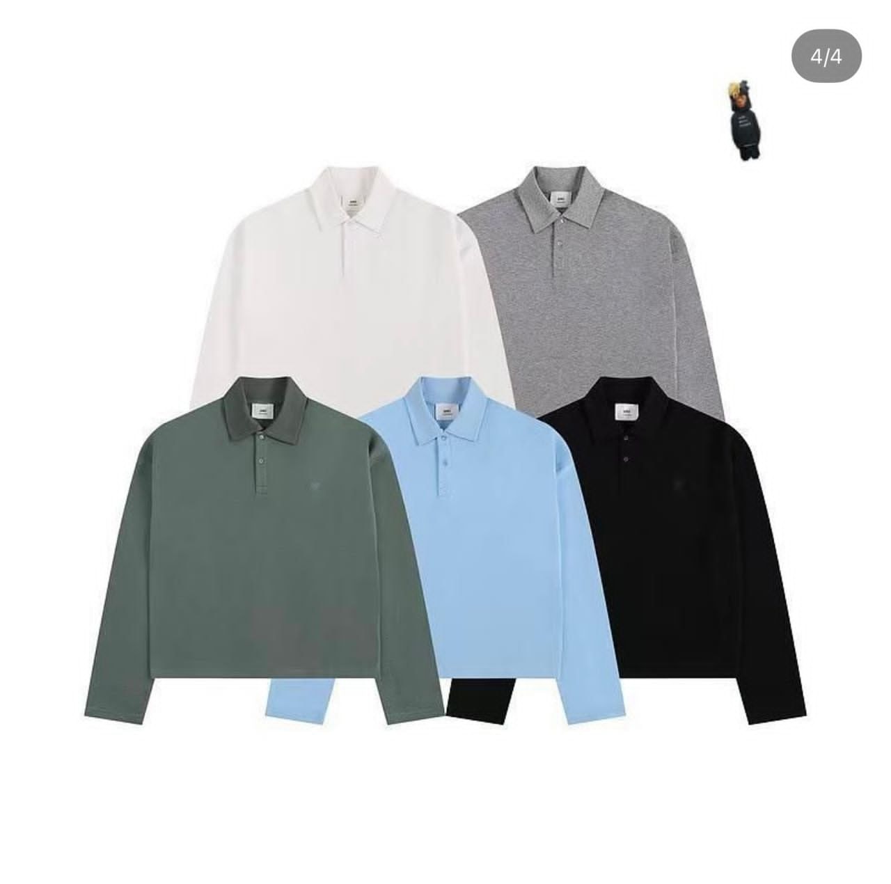 Five AMI long sleeve polo shirts laid flat in white, gray, green, light blue, and black.