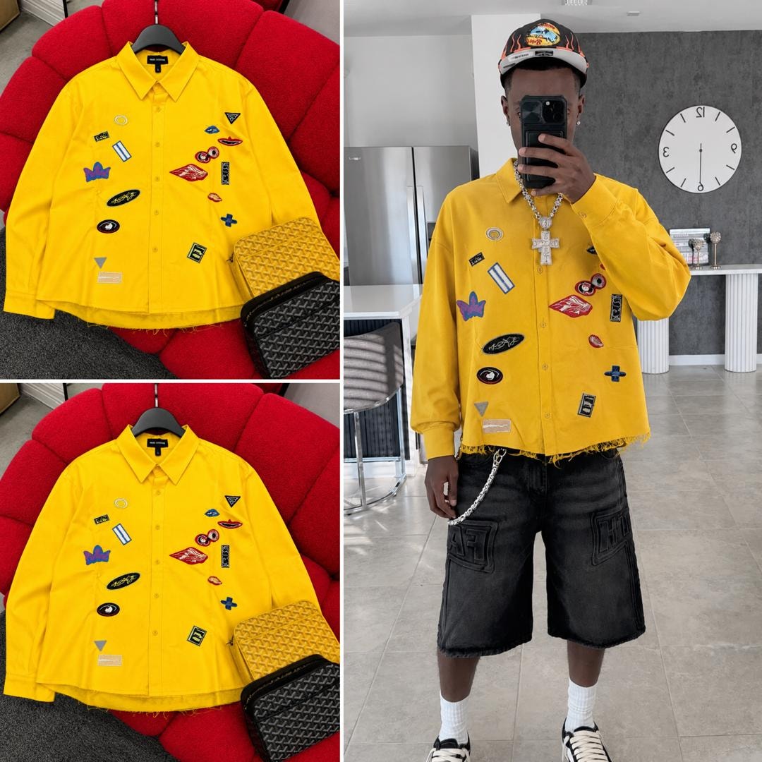 Yellow Marc Lewis patch shirt flat lay and modeled taking mirror selfie.