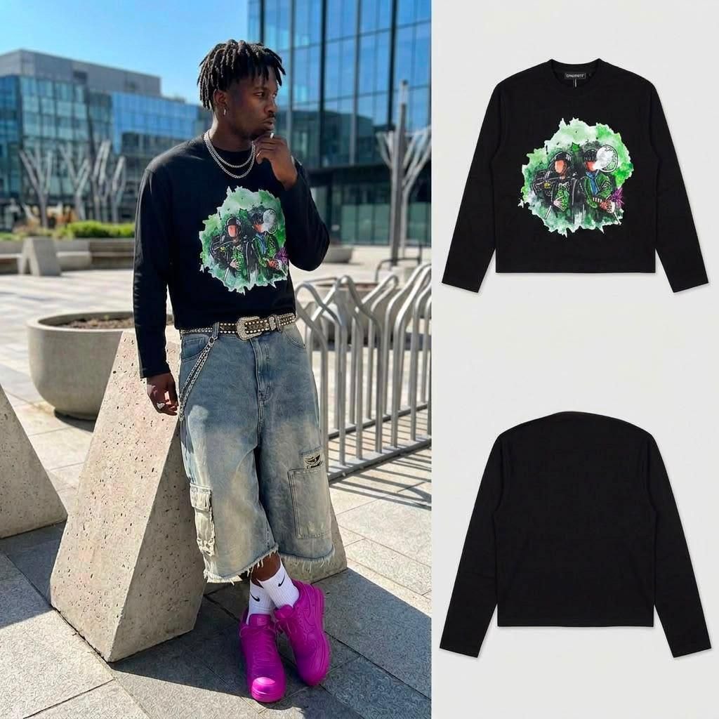 Man posing in black cropped long sleeve armed figures graphic top with front and back views.
