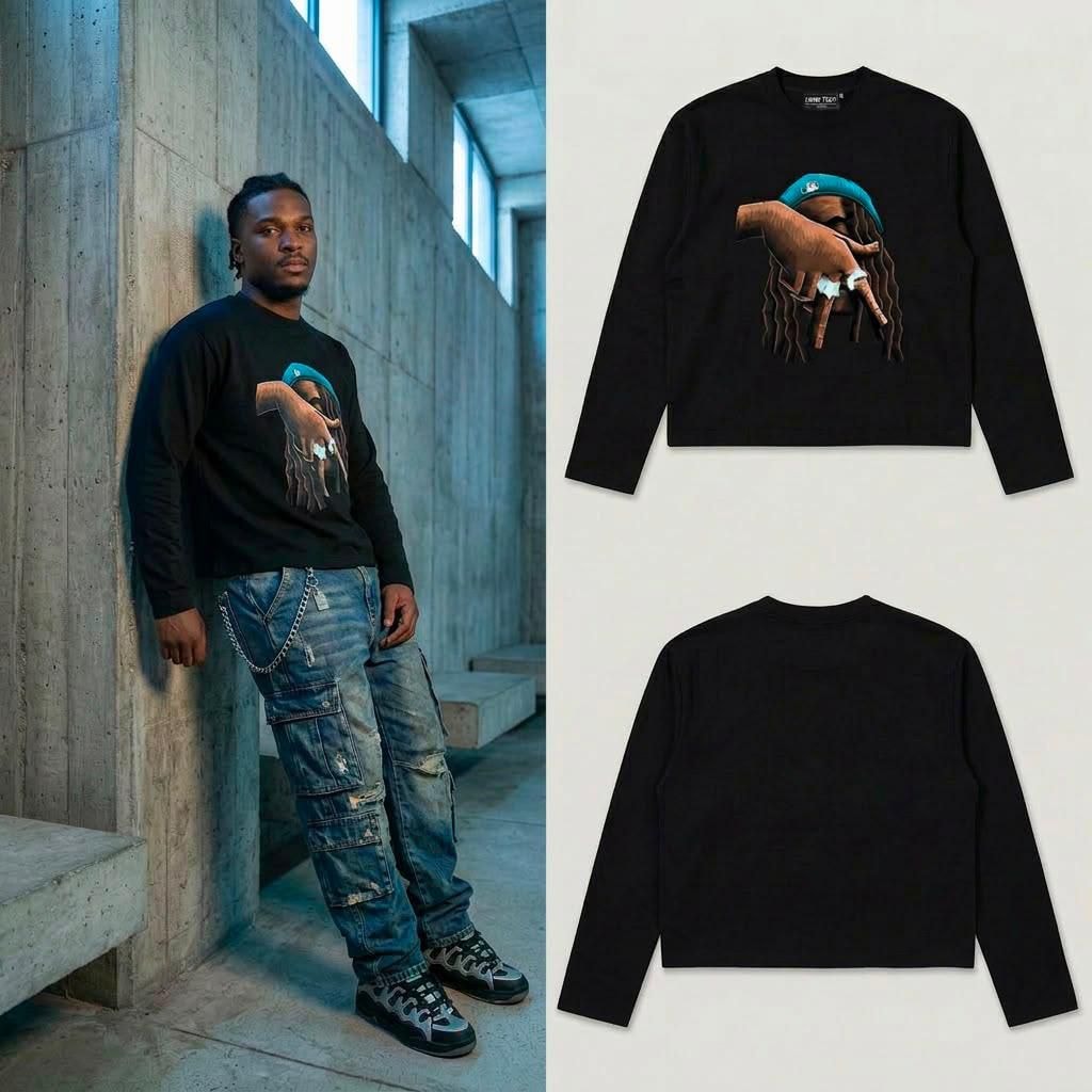 Man leaning in black cropped long sleeve dreadlock hand graphic top with front and back flats.
