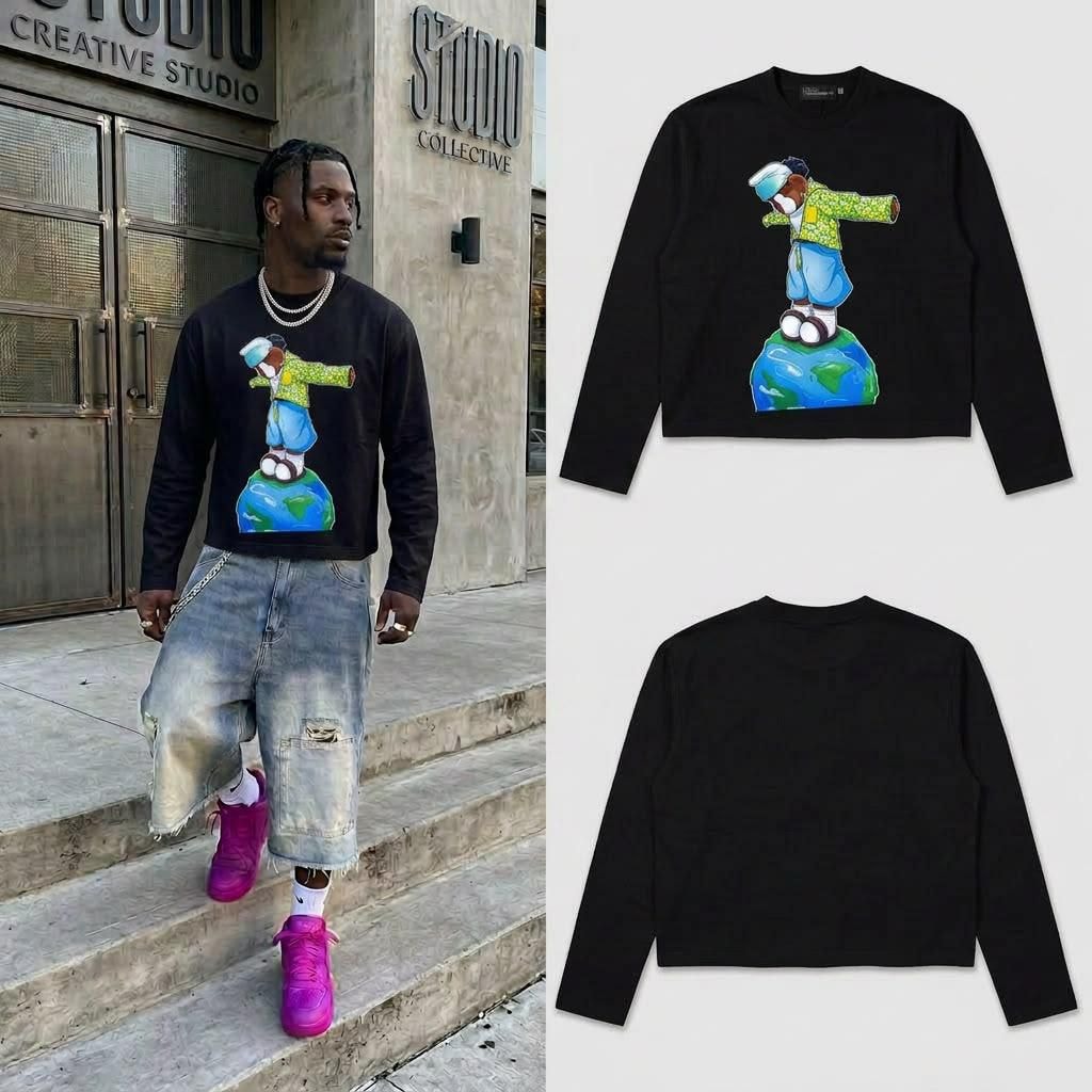 Man in black cropped long sleeve dabbing globe graphic top with front and back flats.