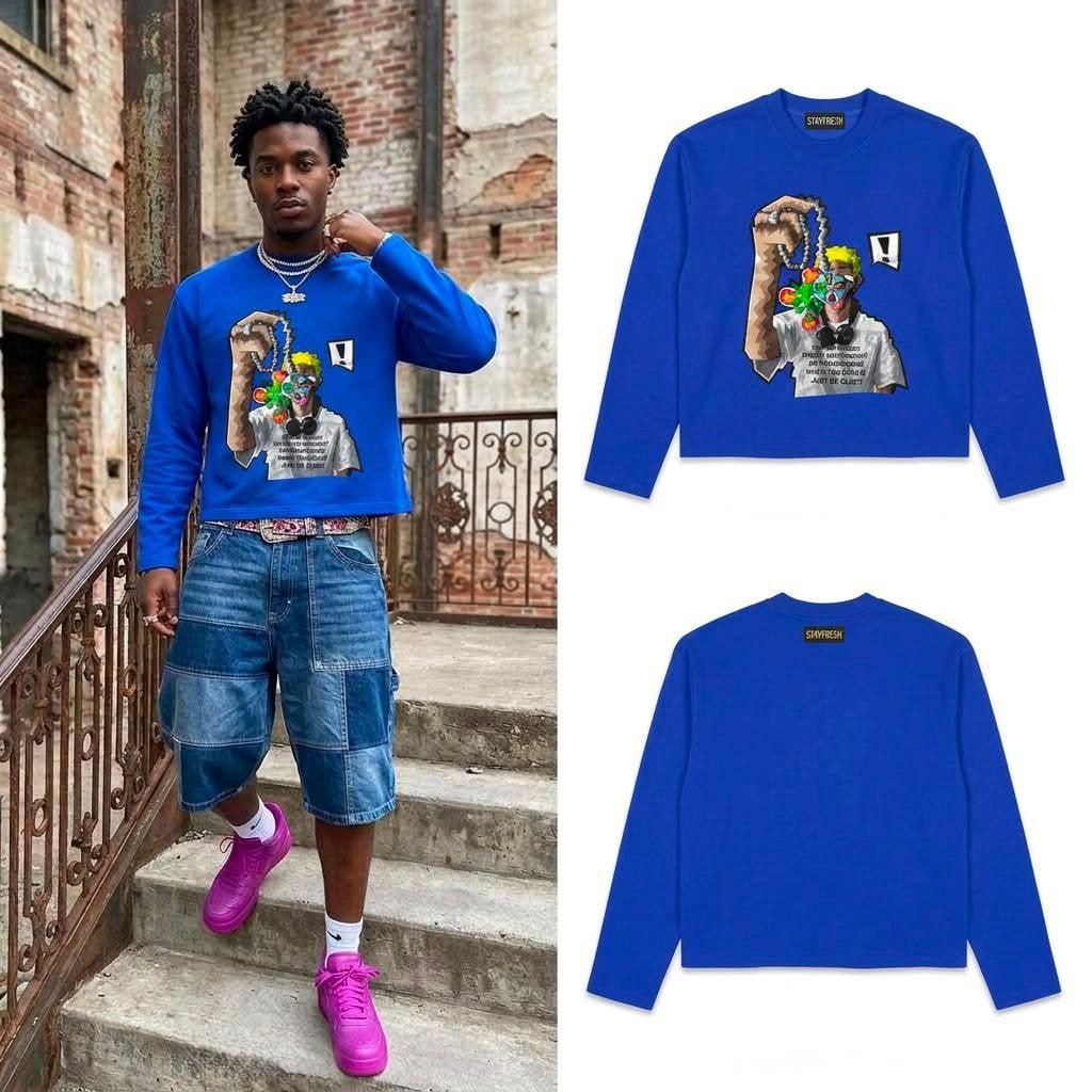 Man modeling blue cropped long sleeve graphic top with front and back flat views.