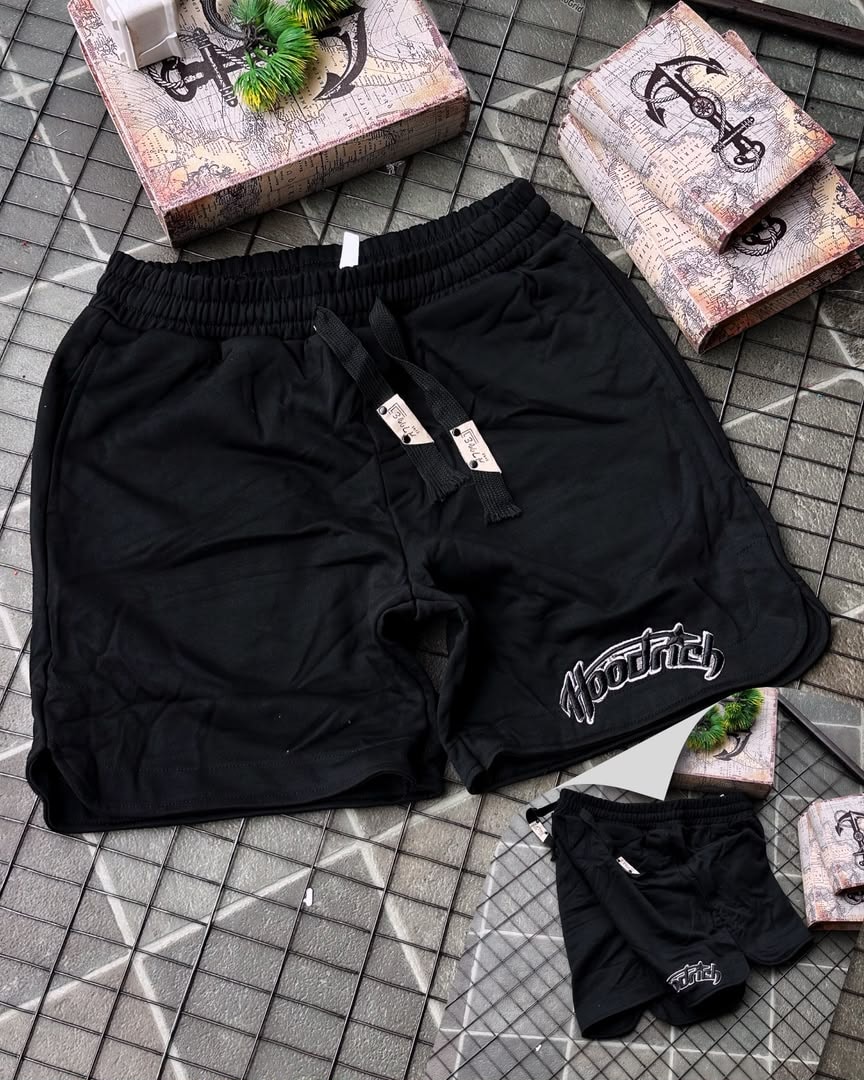 Black Hoodrich fleece shorts shown with smaller version on tiled background.