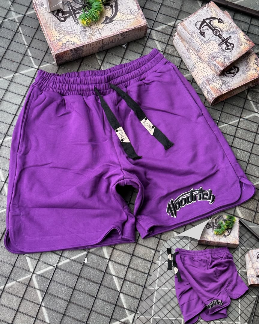Purple Hoodrich fleece shorts with embroidered detail and drawcord.