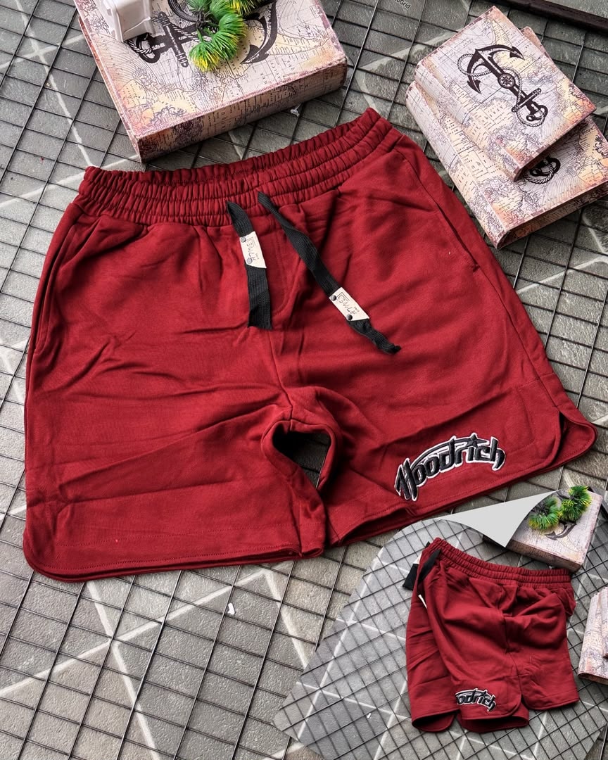 Burgundy Hoodrich fleece shorts featuring elastic waist and signature embroidery.
