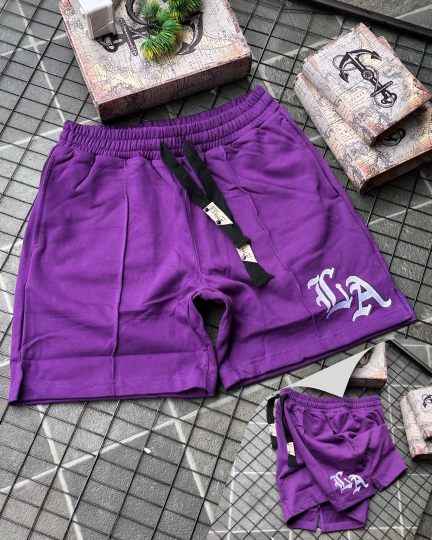 Purple LA embroidered fleece shorts with black drawcord and embroidery.