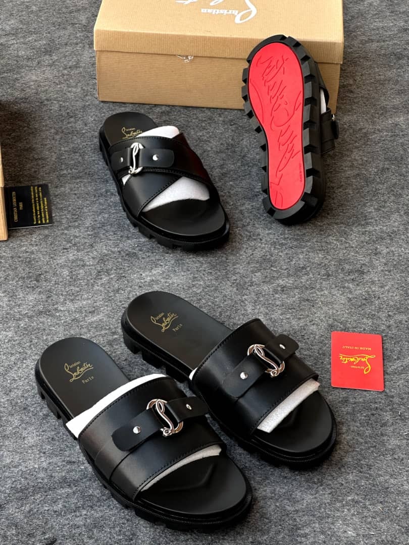 Multiple views of black Louboutin slides showing insole logo, buckle detail and red bottom.