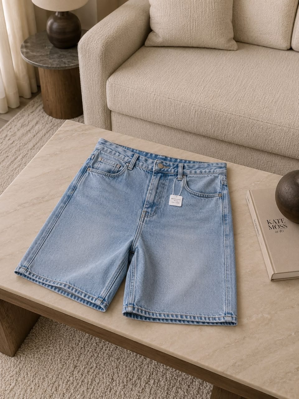 Light blue baggy plain denim shorts on display.