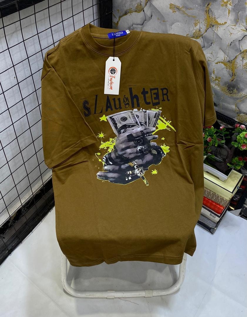 Olive t-shirt with hand holding money, SLAughter text and yellow splatter graphic.