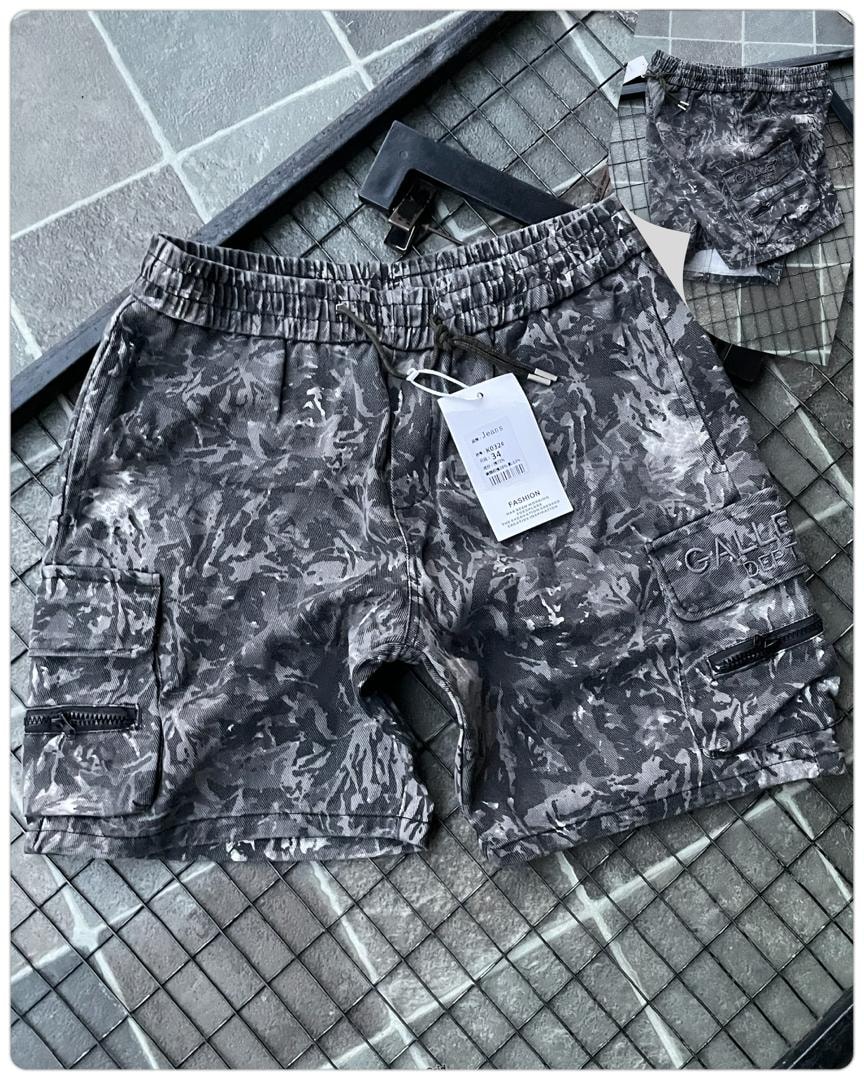 Flat lay of gray camo cargo shorts with tag, pockets and back view.