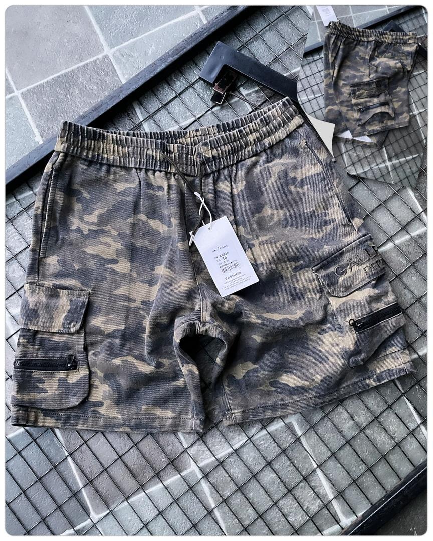 Flat lay of olive green camo cargo shorts with tag and back view inset.