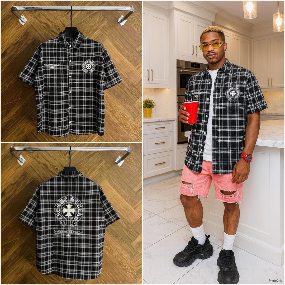 Black plaid embroidered shirt on hanger and modeled in kitchen lifestyle setting.