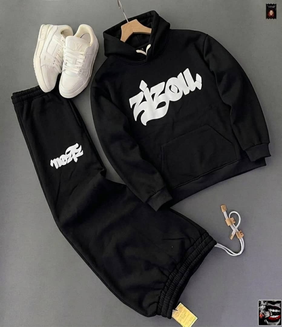 Black RIZON script hoodie and matching jogger pants with white sneakers.