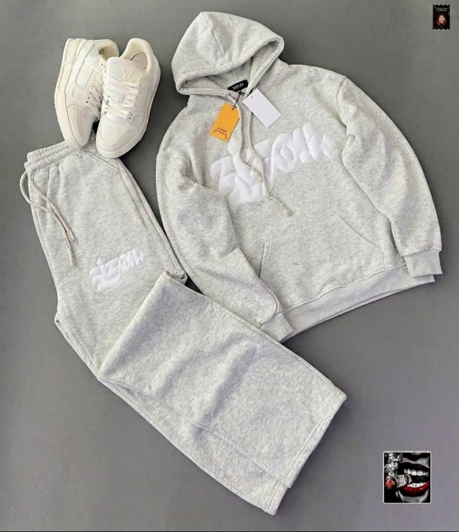 Light gray RIZON puffy logo hoodie and matching jogger pants with white sneakers.