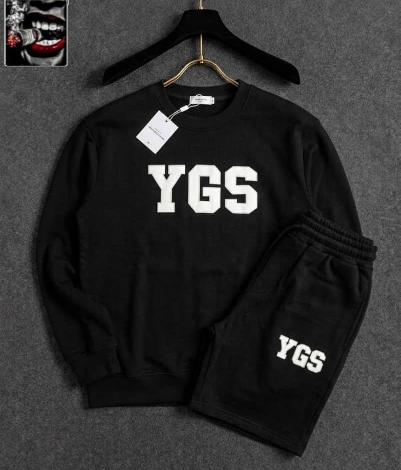 Black YGS two-piece set with large white logo print on sweatshirt and shorts.