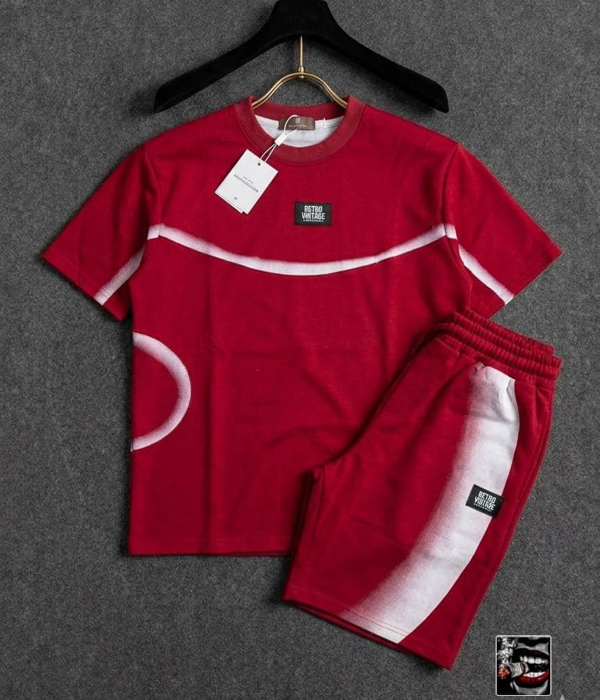 Red RETRO VINTAGE two-piece set with white curved stripe and circle detail.