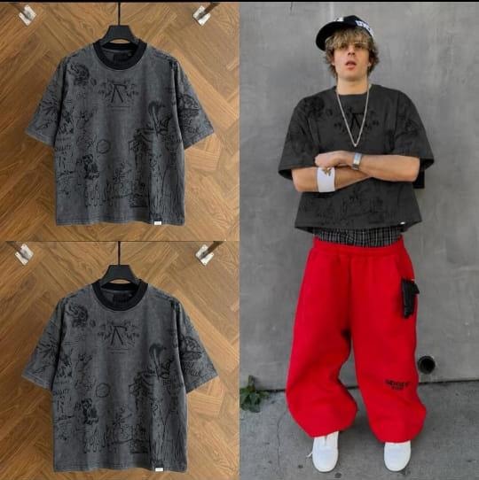 Dark gray all-over print polo t-shirt shown in flat lay and on model wearing with red cargo pants.