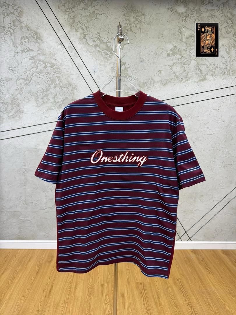 Maroon striped Onesthing embroidered t-shirt on hanger, front view.