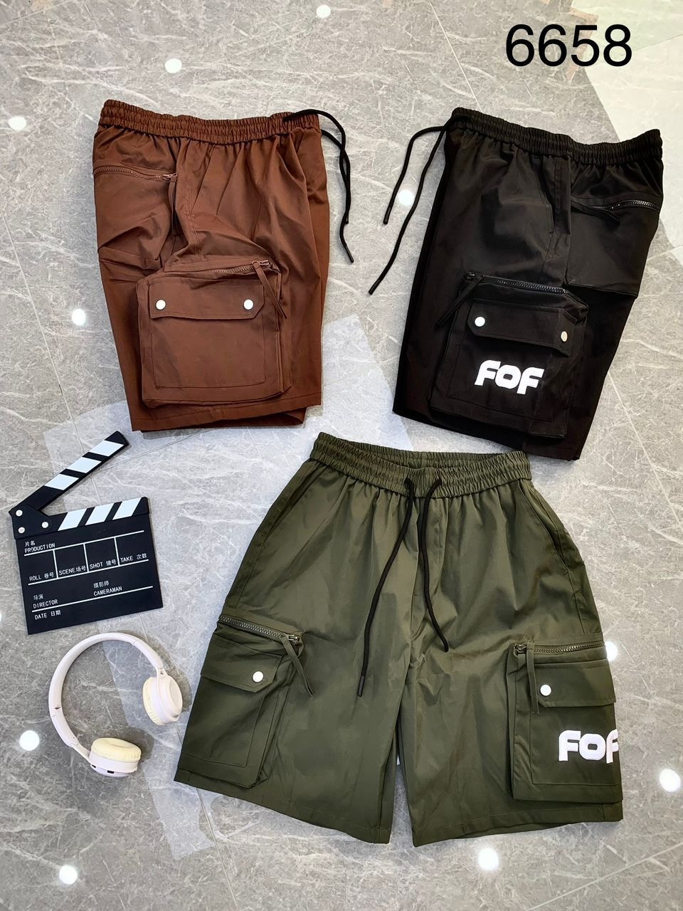 Brown, black, and olive combat cargo shorts showing FOF print with accessories.