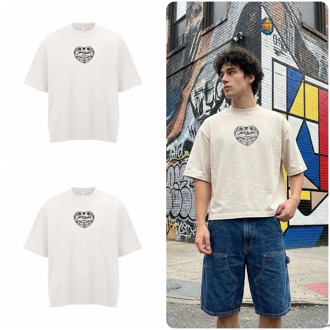 Cream oversized t-shirt with heart logo on chest and large heart on back, flat and model views.