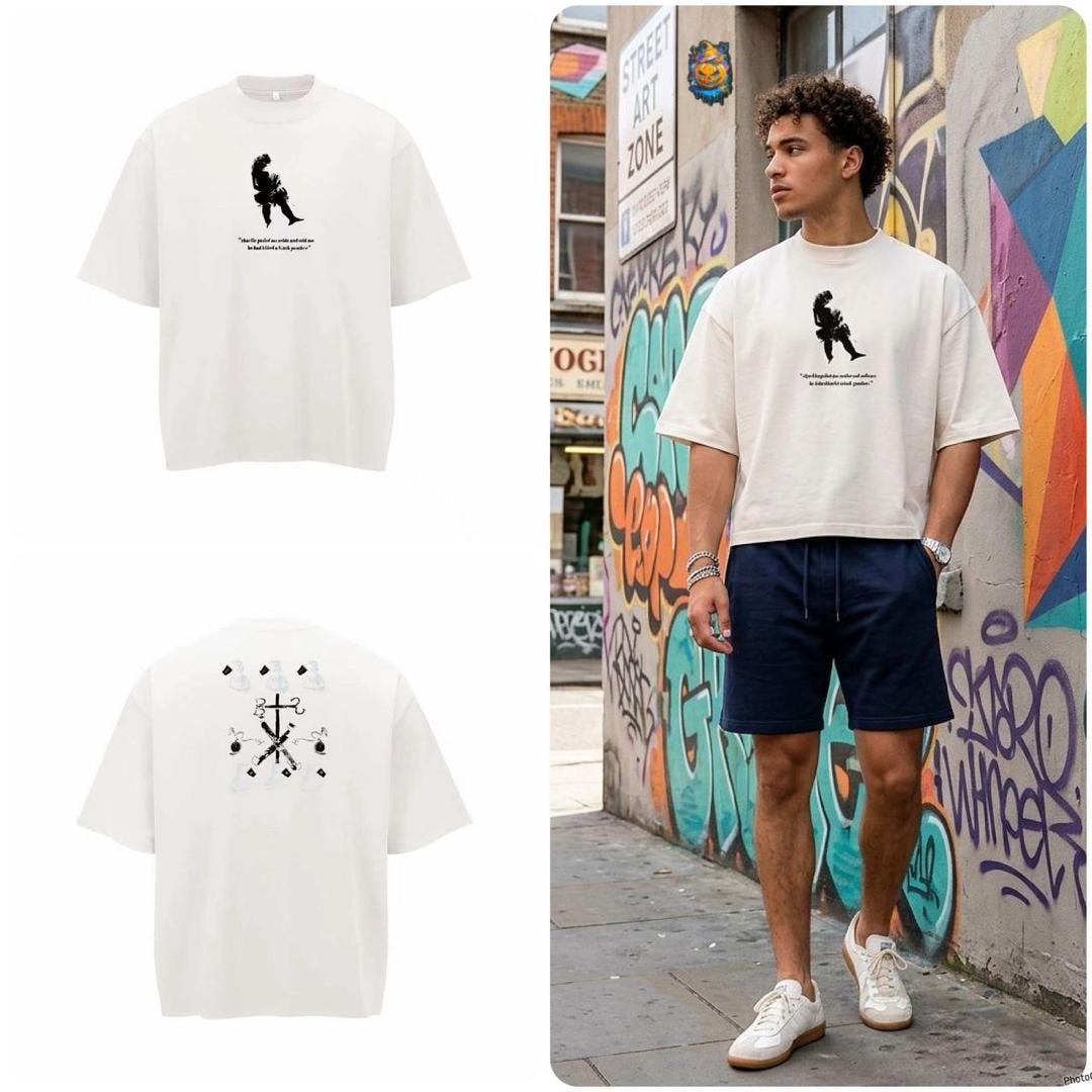 Cream oversized t-shirt with black silhouette graphic on front and cross design on back, flat and model views.