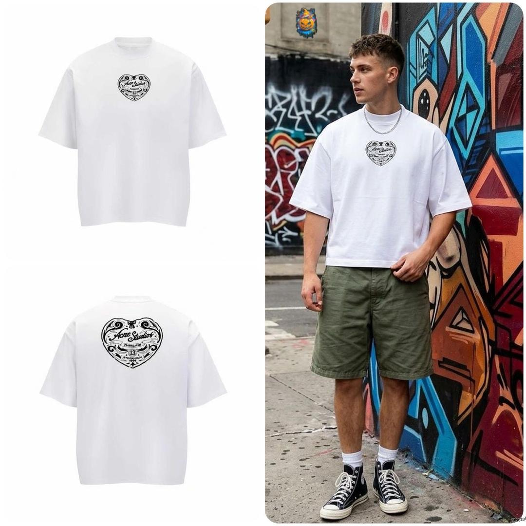 White oversized t-shirt with heart logo on chest and large heart on back, flat and model views.