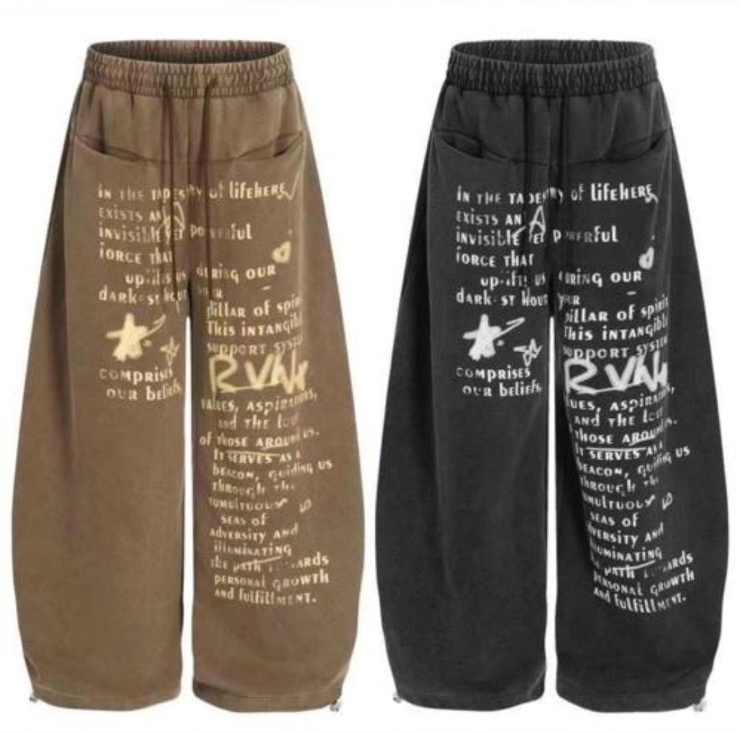 Olive and black joggers with white text prints shown side by side.