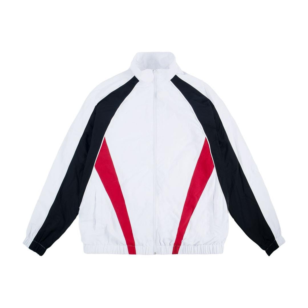 White zip-up colorblock jacket with black sleeves and red panels.