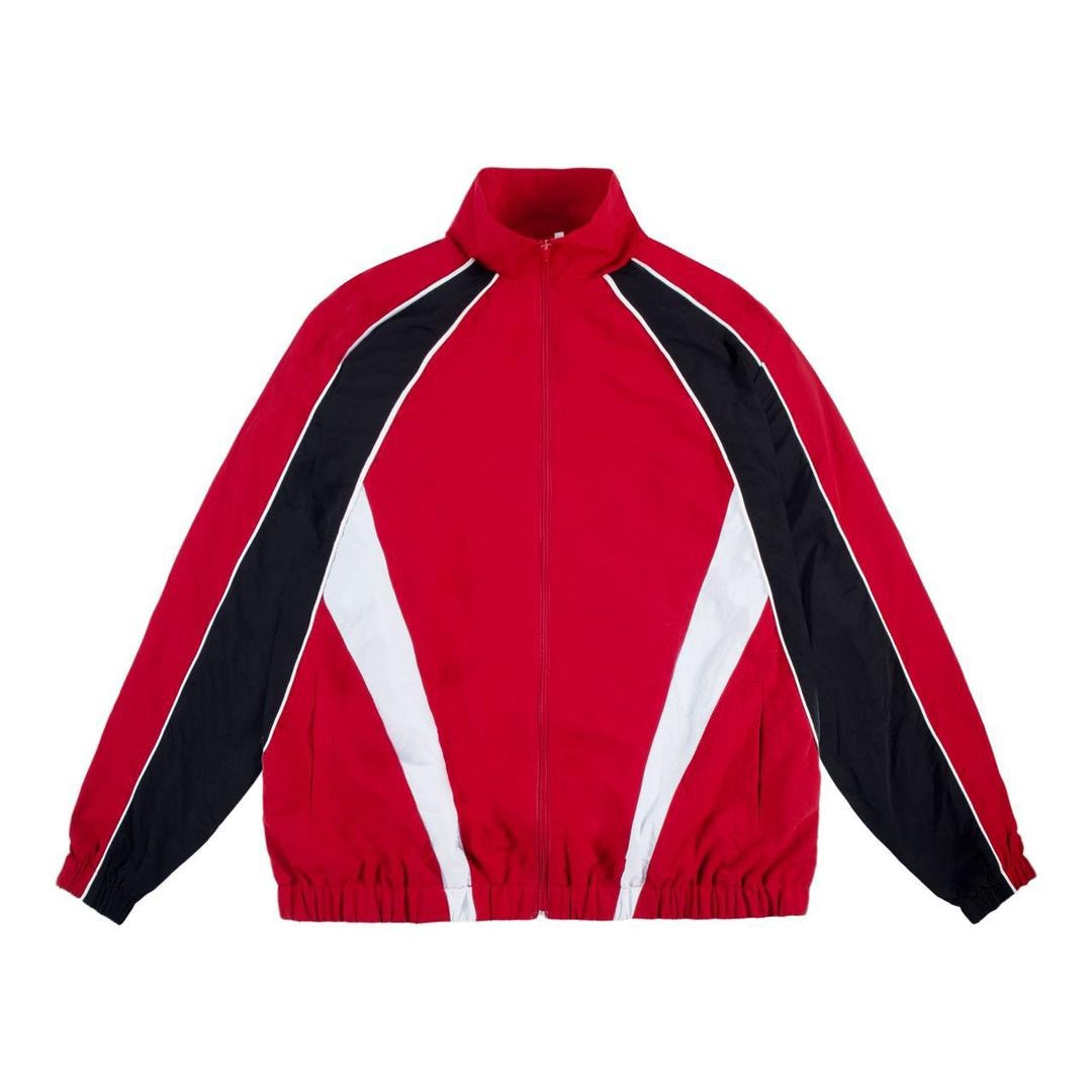 Red zip-up colorblock jacket with black sleeves and white panels.