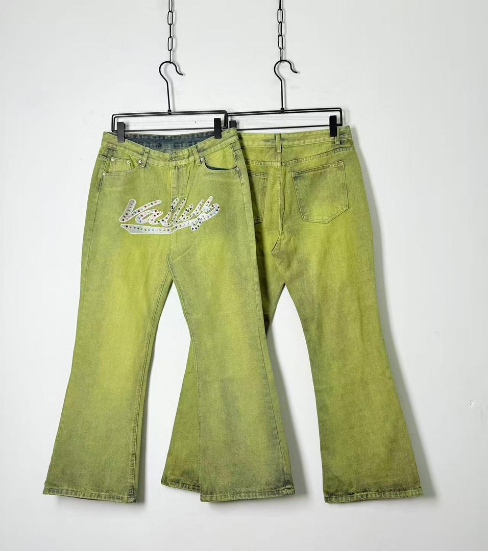 Lime green baggy flared jeans with Valley rhinestone text on front and back view.