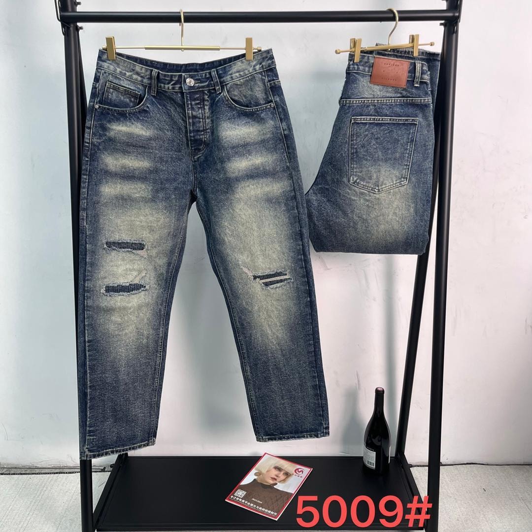 Front and back views of blue distressed baggy jeans on a clothing rack with style number 5009.
