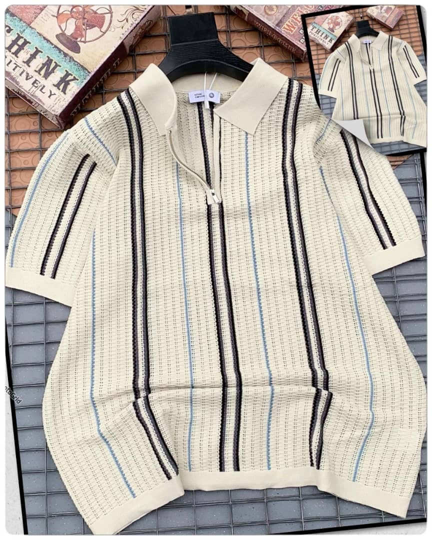 Cream striped knitted zip polo shirt flat lay on grid with inset.